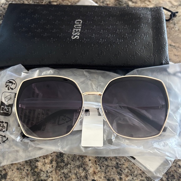 Guess Accessories - NWT Guess Sunglasses.  Very cool. Geometric design.